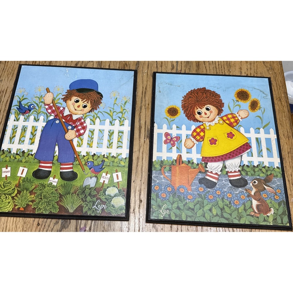 VINTAGE Pair Raggedy Ann &โ Andy gardening PICTURES Some Water Damage